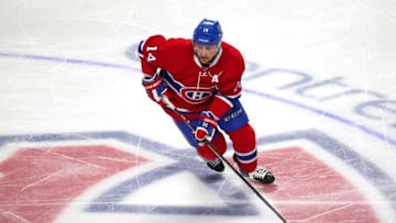 Apr 9, 2016; Montreal, Quebec, CAN; Montreal Canadiens center Tomas Plekanec (14) skates with the puck against Tampa Bay Lightning during the first period at Bell Centre. Mandatory Credit: Jean-Yves Ahern-USA TODAY Sports