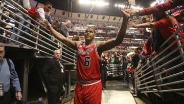 The Chicago Bulls' Cristiano Felicio (6) high-fives fans following a 105-102 win against the Cleveland Cavaliers at the United Center in Chicago on Saturday, April 9, 2016. (Nuccio DiNuzzo/Chicago Tribune/TNS via Getty Images)