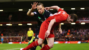 LIVERPOOL, ENGLAND - JANUARY 26: Jon Flanagan of Liverpool holds off Marko Arnautovic of Stoke City during the Capital One Cup semi final second leg match between Liverpool and Stoke City at Anfield on January 26, 2016 in Liverpool, England. (Photo by Clive Brunskill/Getty Images)