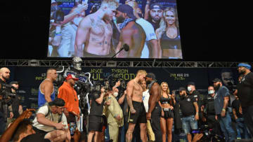 CLEVELAND, OHIO - AUGUST 28: Jake Paul and Tyron Woodley face off during the weigh in event at the State Theater prior to their August 29 fight on August 28, 2021 in Cleveland, Ohio. (Photo by Jason Miller/Getty Images)