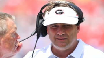 ATHENS, GA - SEPTEMBER 15: Head Coach Kirby Smart of the Georgia Bulldogs decides on a play call against the Middle Tennessee Blue Raiders on September 15, 2018 at Sanford Stadium in Athens, Georgia. (Photo by Scott Cunningham/Getty Images)