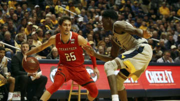MORGANTOWN, WV - FEBRUARY 26: Davide Moretti #25 of the Texas Tech Red Raiders looks to pass against the West Virginia Mountaineers at the WVU Coliseum on February 26, 2018 in Morgantown, West Virginia. (Photo by Justin K. Aller/Getty Images)