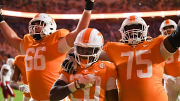 Tennessee running back Jaylen Wright (20) celebrates his touchdown with offensive linemen Dayne Davis (66) and Jerome Carvin (75) in the NCAA football game between the Tennessee Volunteers and South Alabama Jaguars in Knoxville, Tenn. on Saturday, November 20, 2021.Utvsal1120
