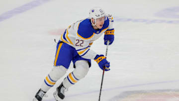 Apr 4, 2023; Sunrise, Florida, USA; Buffalo Sabres right wing Jack Quinn (22) moves the puck during the third period against the Florida Panthers at FLA Live Arena. Mandatory Credit: Sam Navarro-USA TODAY Sports