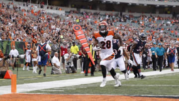 NFL DFS Bargain Bin: CINCINNATI, OH - AUGUST 09: Joe Mixon #28 of the Cincinnati Bengals runs into the end zone for a 24-yard touchdown reception in the first quarter of a preseason game against the Chicago Bears at Paul Brown Stadium on August 9, 2018 in Cincinnati, Ohio. (Photo by Joe Robbins/Getty Images)