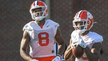 Clemson wide receiver Adam Randall (8) runs near wide receiver Dacari Collins (3) in a drill during Spring practice in Clemson, S.C. Friday, March 4, 2022.Clemson Spring Football Practice March 4
