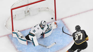 LAS VEGAS, NEVADA - APRIL 16: Shea Theodore #27 of the Vegas Golden Knights scores a first-period goal against Martin Jones #31 of the San Jose Sharks in Game Four of the Western Conference First Round during the 2019 NHL Stanley Cup Playoffs at T-Mobile Arena on April 16, 2019 in Las Vegas, Nevada. The Golden Knights defeated the Sharks 5-0 to take a 3-1 lead in the series. (Photo by Ethan Miller/Getty Images)