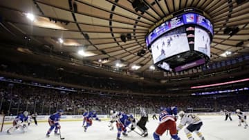Apr 2, 2016; New York, NY, USA; New York Rangers center Derick Brassard (16) wins a face off against the Buffalo Sabres during the third period at Madison Square Garden. The Sabres defeated the Rangers 4-3. Mandatory Credit: Adam Hunger-USA TODAY Sports
