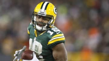 Nov 30, 2014; Green Bay, WI, USA; Green Bay Packers wide receiver Randall Cobb (18) catches a pass during the second half against the New England Patriots at Lambeau Field. The Packers won 26-21. Mandatory Credit: Chris Humphreys-USA TODAY Sports