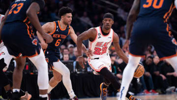 NEW YORK, NEW YORK - MARCH 29: Jimmy Butler #22 of the Miami Heat is guarded by Quentin Grimes #6 of the New York Knicks during the first quarter of the game at Madison Square Garden on March 29, 2023 in New York City. NOTE TO USER: User expressly acknowledges and agrees that, by downloading and or using this photograph, User is consenting to the terms and conditions of the Getty Images License Agreement. (Photo by Dustin Satloff/Getty Images)