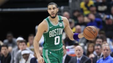 Jayson Tatum #0 of the Boston Celtics dribbles the ball against the Indiana Pacers at Bankers Life Fieldhouse on March 10, 2020 in Indianapolis, Indiana. NOTE TO USER: User expressly acknowledges and agrees that, by downloading and or using this photograph, User is consenting to the terms and conditions of the Getty Images License Agreement. (Photo by Andy Lyons/Getty Images)