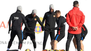 (L-R) Barcelona's Croatian midfielder Ivan Rakitic, Barcelona's Argentinian forward Lionel Messi, Barcelona's French forward Ousmane Dembele, and Barcelona's French defender Lucas Digne take part in a training session at the Sports Center FC Barcelona Joan Gamper in Sant Joan Despi, near Barcelona on December 22, 2017 on the eve of the Spanish League 'Clasico' football match Real Madrid CF vs FC Barcelona. / AFP PHOTO / LLUIS GENE (Photo credit should read LLUIS GENE/AFP/Getty Images)