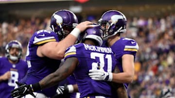 MINNEAPOLIS, MN - JANUARY 1: Jerick McKinnon #21 of the Minnesota Vikings celebrates with teammates after scoring a 10 yard touchdown run in the third quarter of the game against the Chicago Bears on January 1, 2017 at US Bank Stadium in Minneapolis, Minnesota. (Photo by Hannah Foslien/Getty Images)