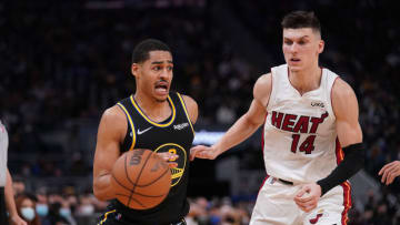 Golden State Warriors guard Jordan Poole (3) drives past Miami Heat guard Tyler Herro (14)(Cary Edmondson-USA TODAY Sports)