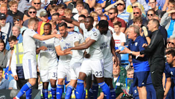 LONDON, ENGLAND - SEPTEMBER 15: Sol Bamba of Cardiff City celebrates with teammates after scoring his team's first goal during the Premier League match between Chelsea FC and Cardiff City at Stamford Bridge on September 15, 2018 in London, United Kingdom. (Photo by Marc Atkins/Getty Images)