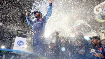 MARTINSVILLE, VIRGINIA - OCTOBER 27: Martin Truex Jr, driver of the #19 Auto Owners Insurance Toyota, celebrates in Victory Lane after winning the Monster Energy NASCAR Cup Series First Data 500 at Martinsville Speedway on October 27, 2019 in Martinsville, Virginia. (Photo by Matt Sullivan/Getty Images)