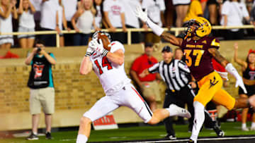 LUBBOCK, TX - SEPTEMBER 16: Dylan Cantrell #14 of the Texas Tech Red Raiders makes the catch for a touchdown against Joey Bryant #37 of the Arizona State Sun Devils during the first half on September 16, 2017 at Jones AT&T Stadium in Lubbock, Texas. (Photo by John Weast/Getty Images)