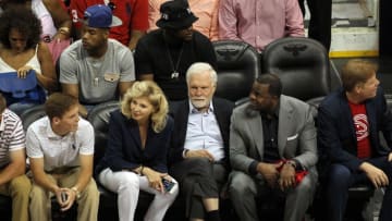 May 20, 2015; Atlanta, GA, USA; Atlanta Hawks former team owner Ted Turner (center) attends game one of the Eastern Conference Finals of the NBA Playoffs between the Atlanta Hawks and the Cleveland Cavaliers at Philips Arena. Mandatory Credit: Brett Davis-USA TODAY Sports