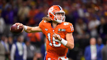 NEW ORLEANS, LA - JANUARY 13: Trevor Lawrence #16 of the Clemson Tigers passes against the LSU Tigers during the College Football Playoff National Championship held at the Mercedes-Benz Superdome on January 13, 2020 in New Orleans, Louisiana. (Photo by Jamie Schwaberow/Getty Images)