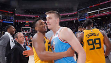 SACRAMENTO, CA - MARCH 3: Bogdan Bogdanovic #8 of the Sacramento Kings greets Donovan Mitchell #45 of the Utah Jazz after the game on March 3, 2018 at Golden 1 Center in Sacramento, California. Copyright 2018 NBAE (Photo by Rocky Widner/NBAE via Getty Images)