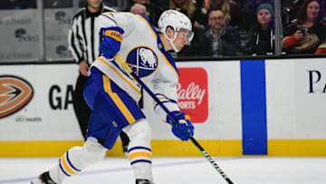 Oct 28, 2021; Anaheim, California, USA; Buffalo Sabres defenseman Robert Hagg (8) shoots on goal against the Anaheim Ducks during the first period at Honda Center. Mandatory Credit: Gary A. Vasquez-USA TODAY Sports