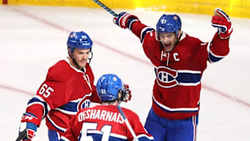 Oct 18, 2016; Montreal, Quebec, CAN; Montreal Canadiens center David Desharnais (51) celebrates with teammates after scoring a goal against the Pittsburgh Penguins during the second period at Bell Centre. Mandatory Credit: Jean-Yves Ahern-USA TODAY Sports
