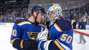 ST. LOUIS, MO - OCTOBER 24: Alexander Steen #20 of the St. Louis Blues congratulates Jordan Binnington #50 of the St. Louis Blues after beating the Los Angeles Kings 5-2 at Enterprise Center on October 24, 2019 in St. Louis, Missouri. (Photo by Joe Puetz/NHLI via Getty Images)