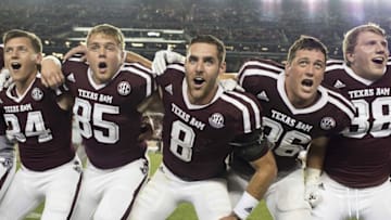 Oct 8, 2016; College Station, TX, USA; Texas A&M Aggies quarterback Trevor Knight (8) celebrates with his teammates after the win over the Tennessee Volunteers at Kyle Field. The Aggies defeated the Volunteers 45-38 in overtime. Mandatory Credit: Jerome Miron-USA TODAY Sports
