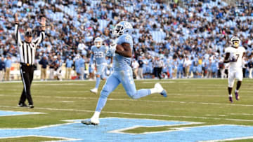 CHAPEL HILL, NORTH CAROLINA - NOVEMBER 17: Rontavius Groves #4 of the North Carolina Tar Heels scores a touchdown against the Western Carolina Catamounts during the first half of their game at Kenan Stadium on November 17, 2018 in Chapel Hill, North Carolina. (Photo by Grant Halverson/Getty Images)