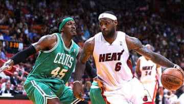 Jan 21, 2014; Miami, FL, USA; Miami Heat small forward LeBron James (6) dribbles the ball around Boston Celtics small forward Gerald Wallace (45) in the second half at American Airlines Arena. The Heat won 93-86. Mandatory Credit: Robert Mayer-USA TODAY Sports