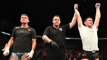 LIVERPOOL, ENGLAND - MAY 27: (R-L) Darren Till of England celebrates his victory over Stephen Thompson in their welterweight bout during the UFC Fight Night event at ECHO Arena on May 27, 2018 in Liverpool, England. (Photo by Josh Hedges/Zuffa LLC/Zuffa LLC via Getty Images)