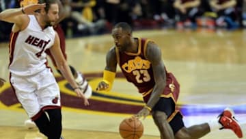 Oct 30, 2015; Cleveland, OH, USA; Cleveland Cavaliers forward LeBron James (23) drives on Miami Heat forward Josh McRoberts (4) during the second quarter at Quicken Loans Arena. Mandatory Credit: Ken Blaze-USA TODAY Sports