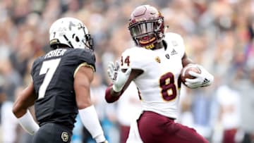 BOULDER, CO - OCTOBER 06: Frank Darby #84 of the Arizona State Sun Devils attempts to elude Nick Fisher #7 of the Colorado Buffaloes after making a reception in the thrid quarter at Folsom Field on October 6, 2018 in Boulder, Colorado. (Photo by Matthew Stockman/Getty Images)