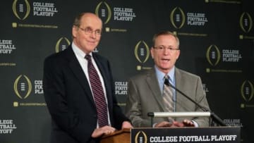 Oct 16, 2013; Irving, TX, USA; College Football Playoff executive director Bill Hancock (left) and new chairman of the playoff committee Jeff Long right) answer questions during a press conference at the College Football Playoff Headquarters. Mandatory Credit: Kevin Jairaj-USA TODAY Sports