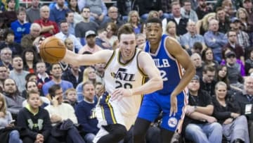 Dec 28, 2015; Salt Lake City, UT, USA; Utah Jazz forward Gordon Hayward (20) drives with the ball defended by Philadelphia 76ers forward Richaun Holmes (22) in the second half at Vivint Smart Home Arena. The Jazz won 95-91. Mandatory Credit: Rob Gray-USA TODAY Sports