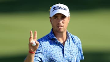 AKRON, OH - AUGUST 04: Justin Thomas reacts after finishing his round on the 18th green during World Golf Championships-Bridgestone Invitational - Round Three at Firestone Country Club South Course on August 4, 2018 in Akron, Ohio. (Photo by Sam Greenwood/Getty Images)