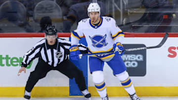 Mar 16, 2021; Newark, New Jersey, USA; Buffalo Sabres left wing Taylor Hall (4) skates against the New Jersey Devils during the second period at Prudential Center. Mandatory Credit: Vincent Carchietta-USA TODAY Sports
