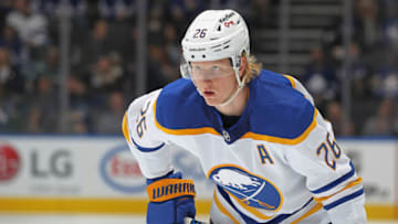TORONTO, ON - APRIL 12: Rasmus Dahlin #26 of the Buffalo Sabres waits for play to resume against the Toronto Maple Leafs during an NHL game at Scotiabank Arena on April 12, 2022 in Toronto, Ontario, Canada. The Sabres defeated the Maple Leafs 5-2. (Photo by Claus Andersen/Getty Images)