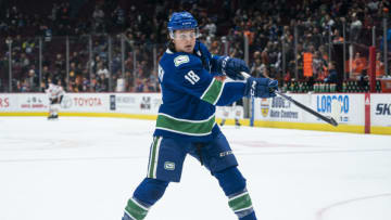 VANCOUVER, BC - DECEMBER 01: Jake Virtanen #18 of the Vancouver Canucks shoots the puck during the pre-game warmup prior to NHL action against the Edmonton Oiler at Rogers Arena on December 1, 2019 in Vancouver, Canada. (Photo by Rich Lam/Getty Images)