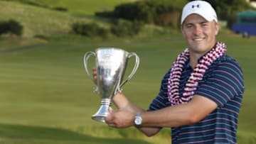 Jan 10, 2016; Maui, HI, USA; PGA golfer Jordan Spieth poses with the trophy after winning the Hyundai Tournament of Champions golf tournament at Kapalua Resort - The Plantation Course. Mandatory Credit: Brian Spurlock-USA TODAY Sports