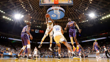 OAKLAND, CA - OCTOBER 8: Alfonzo McKinnie #28 of the Golden State Warriors shoots the ball against the Phoenix Suns during a pre-season game on October 8, 2018 at ORACLE Arena in Oakland, California. NOTE TO USER: User expressly acknowledges and agrees that, by downloading and or using this photograph, user is consenting to the terms and conditions of Getty Images License Agreement. Mandatory Copyright Notice: Copyright 2018 NBAE (Photo by Noah Graham/NBAE via Getty Images)