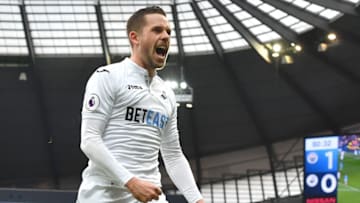 MANCHESTER, ENGLAND - FEBRUARY 05: Swansea City's Gylfi Sigurdsson celebrates scoring the equaliser for Swansea City during the Premier League match between Manchester City and Swansea City at the Etihad Stadium on February 5, Manchester, England. (Photo by Athena Pictures/Getty Images)