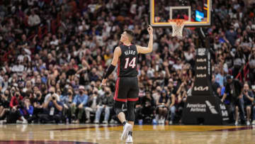 Tyler Herro #14 of the Miami Heat gestures for a three point shot(Photo by Mark Brown/Getty Images)