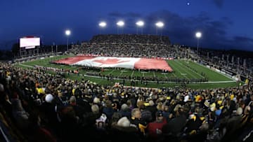 The national athem is played prior to play between the Toronto Argonauts and the Hamilton Tiger-cats in a CFL football game at Tim Hortons Field. (Photo by Claus Andersen/Getty Images)