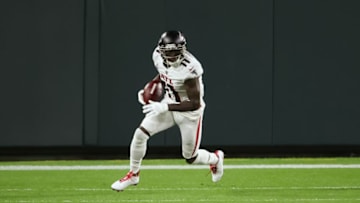 GREEN BAY, WISCONSIN - OCTOBER 05: Julio Jones #11 of the Atlanta Falcons runs with the ball in the first quarter against the Green Bay Packers at Lambeau Field on October 05, 2020 in Green Bay, Wisconsin. (Photo by Dylan Buell/Getty Images)