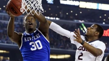 Apr 7, 2014; Arlington, TX, USA; Kentucky Wildcats forward Julius Randle (30) shoots against Connecticut Huskies forward DeAndre Daniels (2) in the second half during the championship game of the Final Four in the 2014 NCAA Mens Division I Championship tournament at AT&T Stadium. Mandatory Credit: Robert Deutsch-USA TODAY Sports