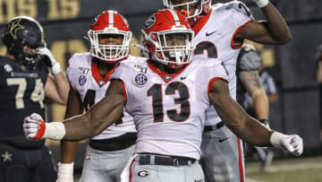 NASHVILLE, TENNESSEE - AUGUST 31: Azeez Ojulari #13 of the Georgia Bulldogs celebrates after a sack against the Vanderbilt Commodores at Vanderbilt Stadium on August 31, 2019 in Nashville, Tennessee. (Photo by Frederick Breedon/Getty Images)