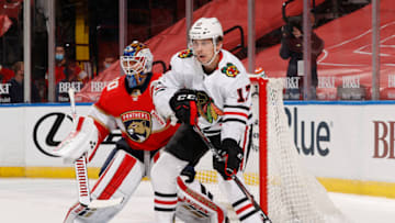 SUNRISE, FL - JANUARY 17: Dylan Strome #17 of the Chicago Blackhawks looks for a tip in attempt in front of Goaltender Chris Driedger #60 of the Florida Panthers at the BB&T Center on January 17, 2021 in Sunrise, Florida. (Photo by Joel Auerbach/Getty Images)