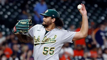 HOUSTON, TEXAS - OCTOBER 01: Sean Manaea #55 of the Oakland Athletics pitches in the first inning against the Houston Astros at Minute Maid Park on October 01, 2021 in Houston, Texas. (Photo by Bob Levey/Getty Images)