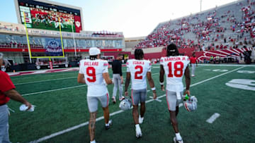 Sep 2, 2023; Bloomington, Indiana, USA; Ohio State Buckeyes wide receiver Jayden Ballard (9), wide receiver Emeka Egbuka (2) and wide receiver Marvin Harrison Jr. (18) walk off the field following the NCAA football game at Indiana University Memorial Stadium. Ohio State won 23-3.